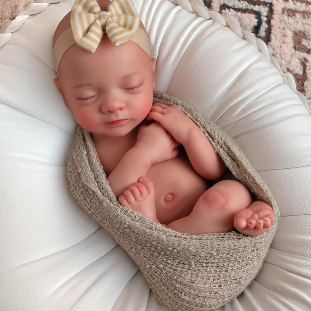 Realistic Baby Doll in Beige Knit Swaddle with Cream & Yellow Bow
